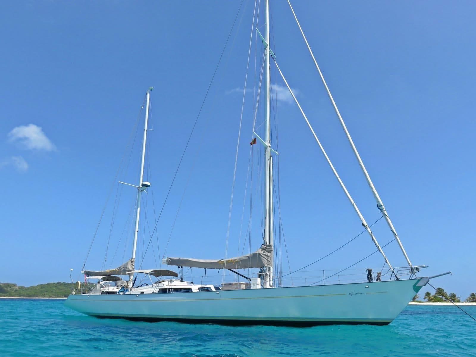 Flying Wing anchored off an Antigua beach
